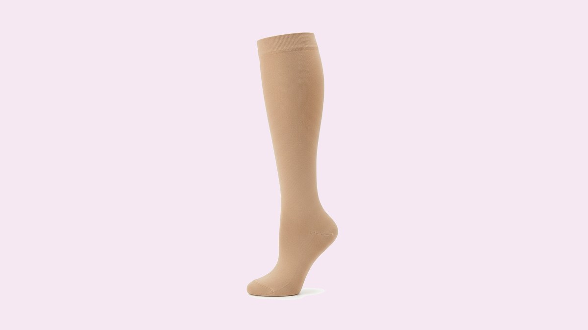 A below-knee graduated compression stocking shown against a plain background